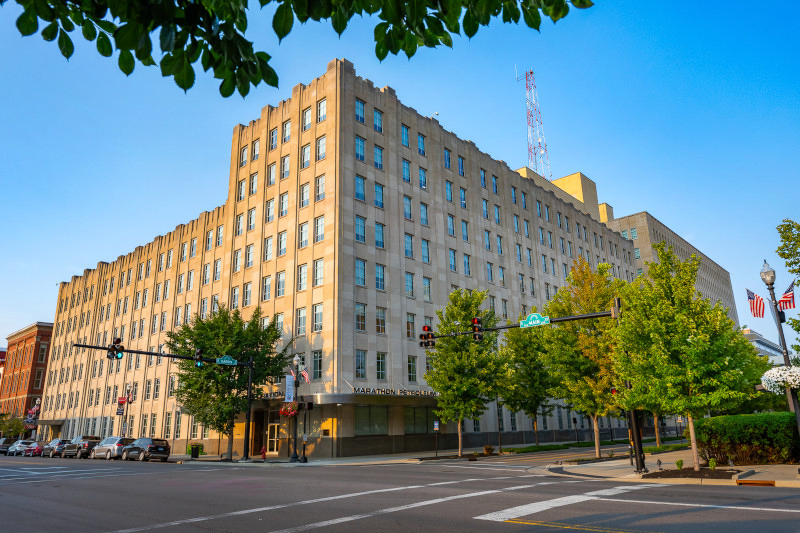 A multi-story office building at the corner of an intersection. 