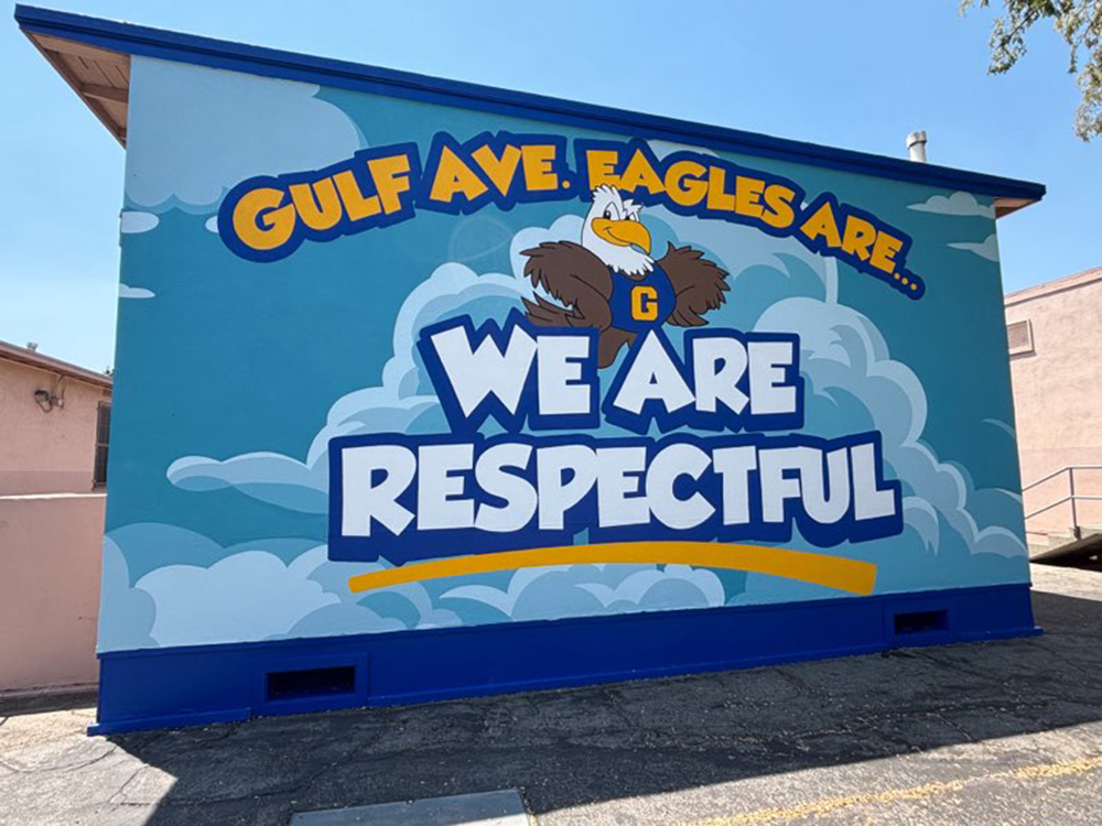 A mural that reads Gulf Ave. Eagles Are ... We Are Respectful. 