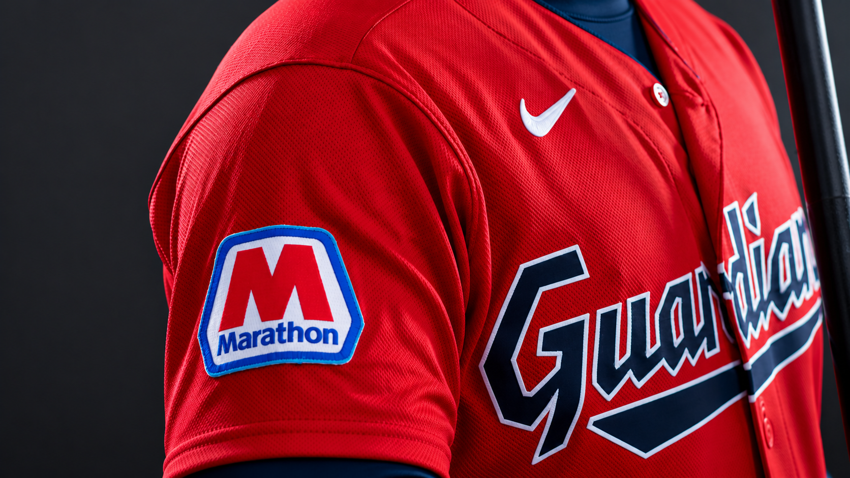  Large Marathon &ldquo;M&rdquo; logo displayed on the sleeve of a baseball uniform.