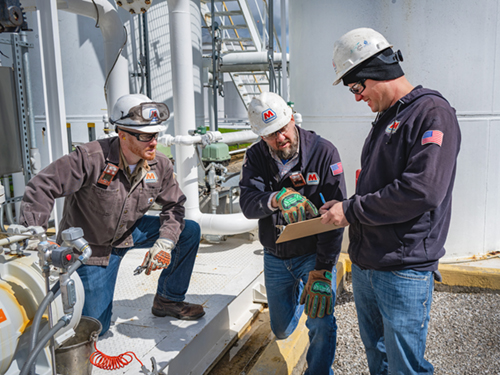 MPC Refining Employees wearing PPE gear and practicing safety.